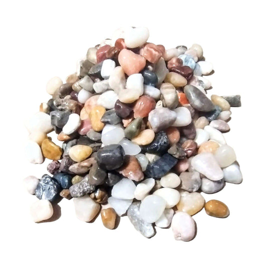 Display of colorful aquarium gravel in a pile